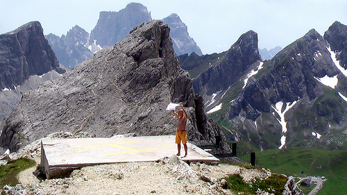 man-drying-tshirt-on-helicopter-landing-pad