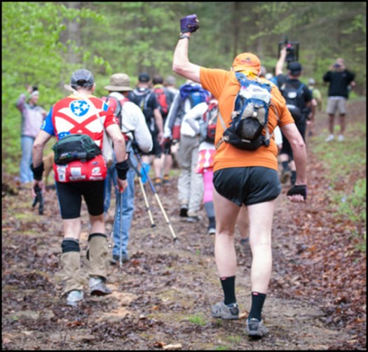 Stu Gleman fist pumps at the start of the Barkley Marathons