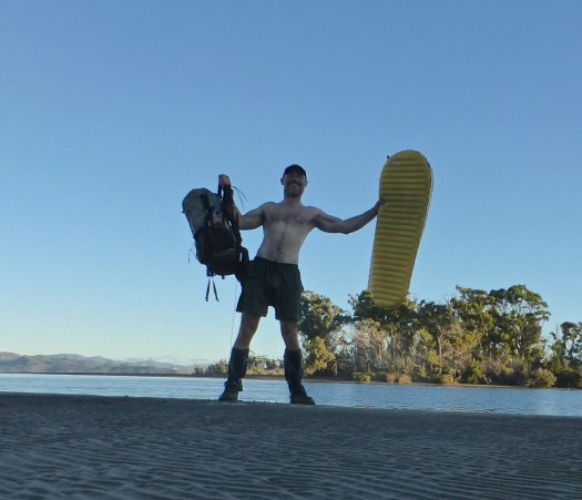 Celebrating after paddling the 150 metres crossing between Piners and Settlement Points on my Thermarest NeoAir. My backpack floated behind, attached with some guyline to my right leg.